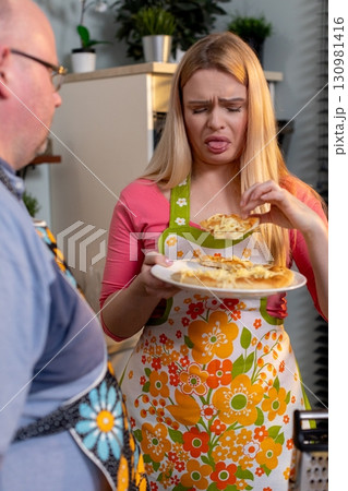 Experiencing a Culinary Disappointment in the Kitchen During a Creative Cooking Session Experiencing a Culinary Disappointment in the Kitchen During a Creative Cooking Session 130981416