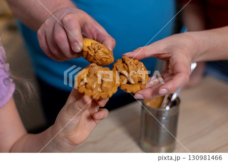 Delicious Cookies A Sweet Family Moment Filled with Joy and Togetherness for Everyone to Enjoy Delicious Cookies A Sweet Family Moment Filled with Joy and Togetherness for Everyone to Enjoy 130981466