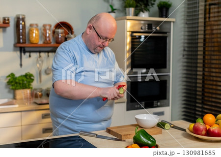 Carefully Preparing Fresh and Quality Ingredients in a Modern Kitchen Setting Environment Carefully Preparing Fresh and Quality Ingredients in a Modern Kitchen Setting Environment 130981685