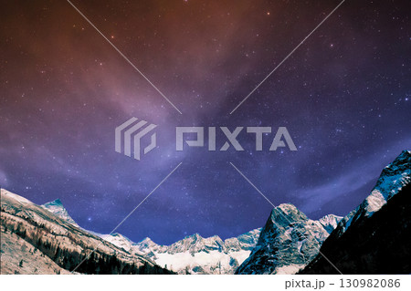 star trails in the mountains snow falling in the mountains star trails in the mountains snow falling in the mountains 130982086