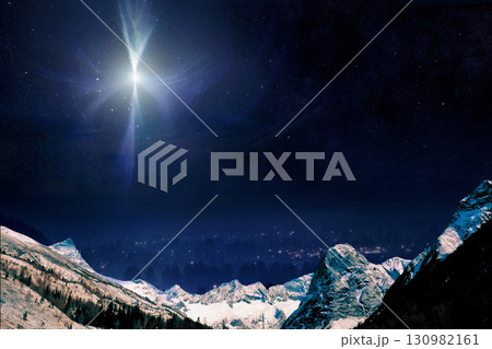 star trails in the mountains snow falling in the mountains 130982161