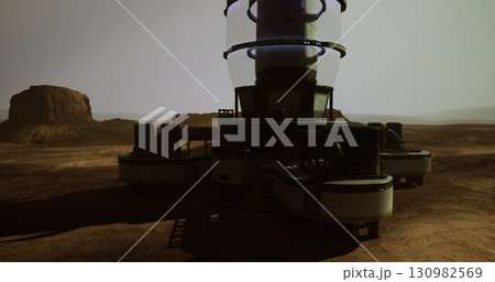 A cutting edge facility stands on a barren Martian landscape, surrounded by reddish rock formations and a distant horizon. 130982569