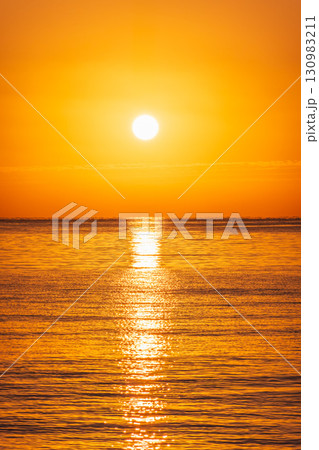 Beautiful red and orange sunrise over the sea. 130983211