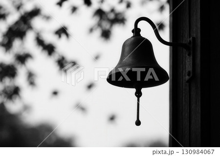 Minimalist School Bell with Blurred Fall Leaves, Autumn Back to School Illustration 130984067