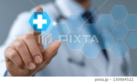 Doctor Touching Digital Health Icon With Blue Cross Symbol 130984522