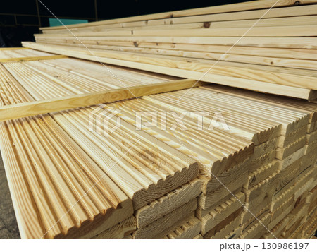 Wooden planks in a hardware store warehouse Wooden planks in a hardware store warehouse 130986197