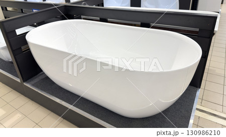 Bathtub in a hardware store 130986210