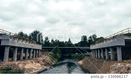 Construction of the city bridge. Construction of the city bridge. 130986217