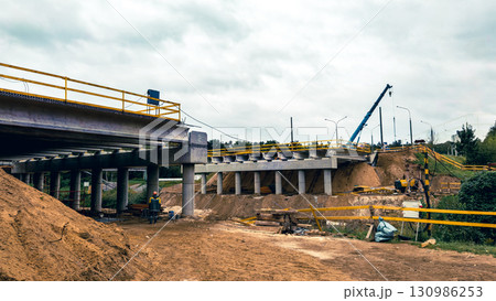 Construction of the city bridge. Construction of the city bridge. 130986253
