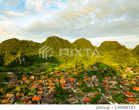 Aerial views of rural Northern Vietnam showcasing traditional villages agricultural landscapes Aerial views of rural Northern Vietnam showcasing traditional villages agricultural landscapes 130986583