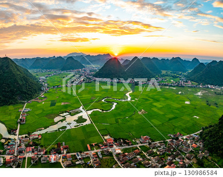 Drone aerial view of landscape mountains view in sunrise or sunset time,High angle view over countryside at northern Vietnam 130986584