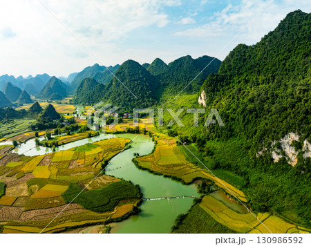 Drone aerial view of landscape mountains view in sunrise or sunset time,High angle view over countryside at northern Vietnam Drone aerial view of landscape mountains view in sunrise or sunset time,High angle view over countryside at northern Vietnam 130986592