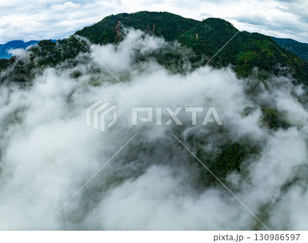 Drone aerial view of landscape mountains view in sunrise or sunset time,High angle view over countryside at northern Vietnam Drone aerial view of landscape mountains view in sunrise or sunset time,High angle view over countryside at northern Vietnam 130986597