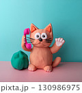 ねんどで作られた電話をする猫 130986975