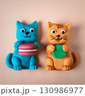 ねんどで作られたお菓子を食べる猫たち 130986977