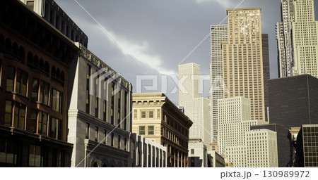 Under a moody sky, towering skyscrapers loom over older architecture in an urban setting. The contrast between modern and classic structures showcases a blend of history and progress. Under a moody sky, towering skyscrapers loom over older architecture in an urban setting. The contrast between modern and classic structures showcases a blend of history and progress. 130989972