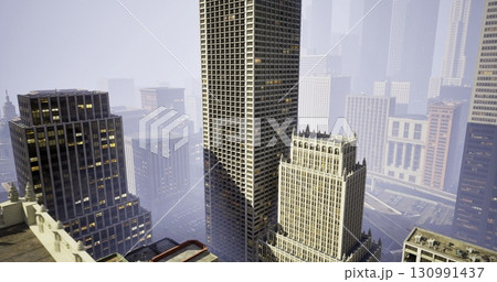 A city skyline reveals tall skyscrapers shrouded in early morning fog. The scene features a mix of modern architecture and historical designs. The atmosphere is quiet and serene. 130991437