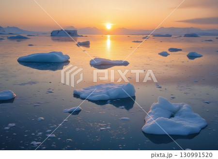Icebergs on Frozen Lake at Sunrise with Golden Light 130991520