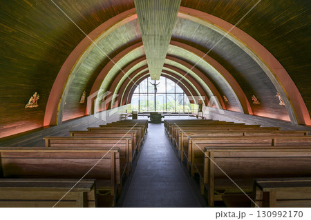 chapel with wooden floor and tables chapel with wooden floor and tables 130992170