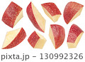 Falling apple slices isolated on white background with clipping path, full depth of field 130992326