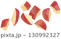 Falling apple slices isolated on white background with clipping path, full depth of field 130992327