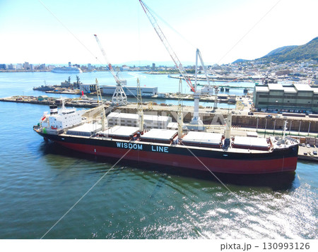 秋の北海道函館市函館港で貨物船を建造中の函館ドックの風景を空撮 秋の北海道函館市函館港で貨物船を建造中の函館ドックの風景を空撮 130993126