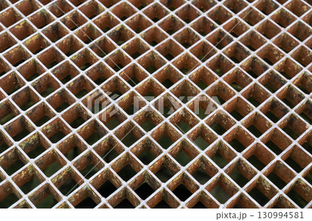 metal lattice of honeycombs close-up, geometric pattern metal lattice of honeycombs close-up, geometric pattern 130994581
