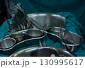 Sterile Surgical Instruments and Bowls Setup 130995617