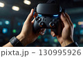 Gamer with Gamepad and VR Headset 130995926
