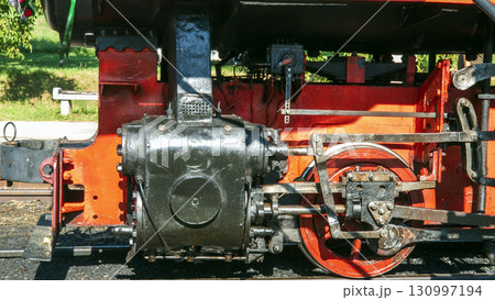 Nitra, Slovakia - September 4, 2025: A vintage steam locomotive on display at the Nitra Agricultural University. Close-up. 130997194