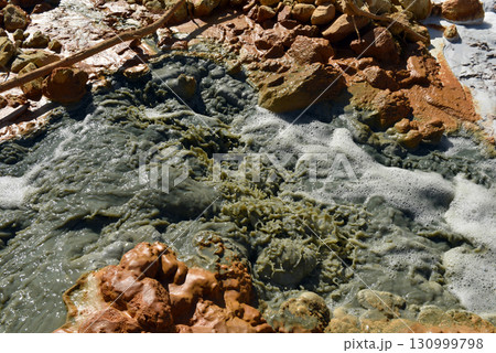 Acid mine water drainage flow, toxic mine waters polluting the environment Acid mine water drainage flow, toxic mine waters polluting the environment 130999798