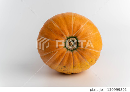 Fresh orange pumpkin on white background, top view 130999891