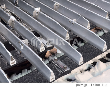 Snowcat machine for snow removal. Preparation ski trails. Snow groomer. Snowy tracks of snowcat in the mountains. Ratrac snowcat. Snow tucker 131001108