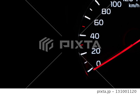 Close up shot of speedometer in car. Car dashboard. Dashboard details with indication lamps.Car instrument panel. Dashboard with speedometer 131001120