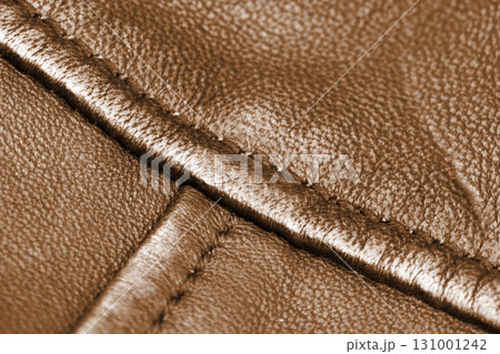 Leather texture background. Part of perforated brown leather details. Perforated leather texture background. Texture leather Leather texture background. Part of perforated brown leather details. Perforated leather texture background. Texture leather 131001242