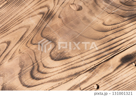 Production of a wooden table from an array of Karagach. Wood Slabs. Exclusive home table, solid wood slab, wood texture background. 131001321