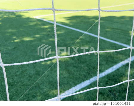 Close-up of a football net.Net on a football goal. Background of football, soccer net. Close-up of Soccer Goal Net 131001431