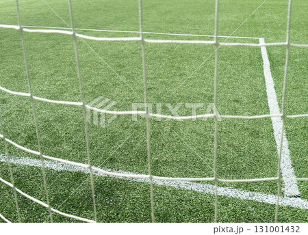 Close-up of a football net.Net on a football goal. Background of football, soccer net. Close-up of Soccer Goal Net Close-up of a football net.Net on a football goal. Background of football, soccer net. Close-up of Soccer Goal Net 131001432