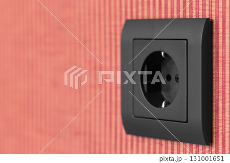 Wall mounted socket board with electrical sockets and a switch. The socket board 131001651