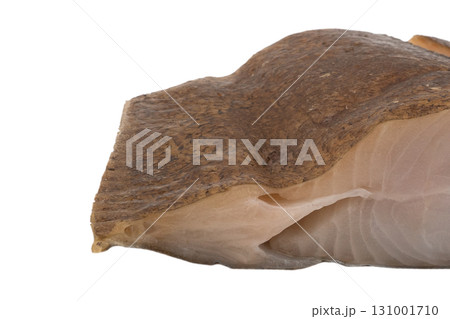Cold smoked halibut fish with skin isolated on white background. Smoked halibut steak isolated 131001710