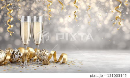 Champagne Flutes with Golden Confetti and Festive Decorations on a Bokeh Background 131003145