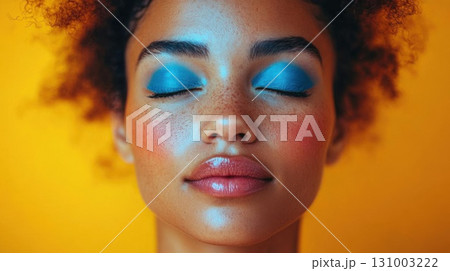 Close up portrait of a beautiful young african american woman with bright make-up. 131003222