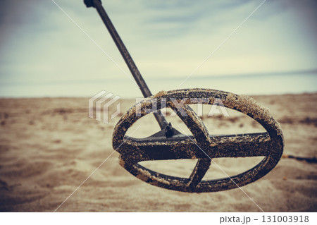 metal detector on sea beach metal detector on sea beach 131003918