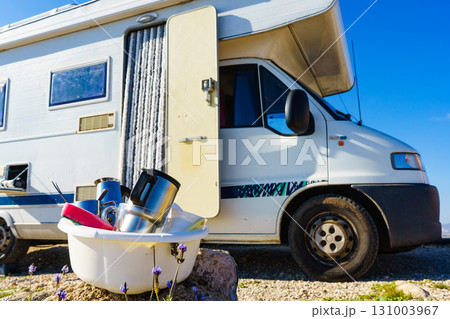 washing dishes in bowl, capming outdoor washing dishes in bowl, capming outdoor 131003967