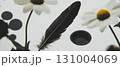 Collage combines geometric shapes and flowers with a close-up of a quill and inkwell. 131004069