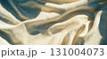 Blank space featuring light linen fabric with natural textures and soft draping for creative use. 131004073