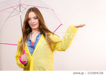 Woman in rainproof coat with umbrella. Forecasting Woman in rainproof coat with umbrella. Forecasting 131004136
