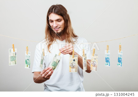 Rich man with laundry of money Rich man with laundry of money 131004245