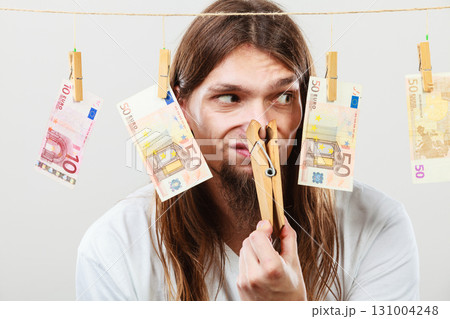 Young man sick of money Young man sick of money 131004248