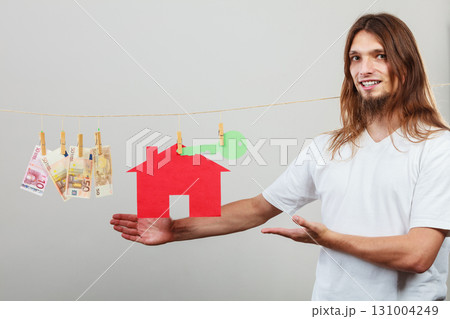 Man seller with money and house Man seller with money and house 131004249